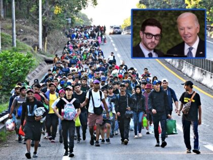 Migrants from a caravan in Tapachula, Chiapas state, Mexico, march while heading to the US