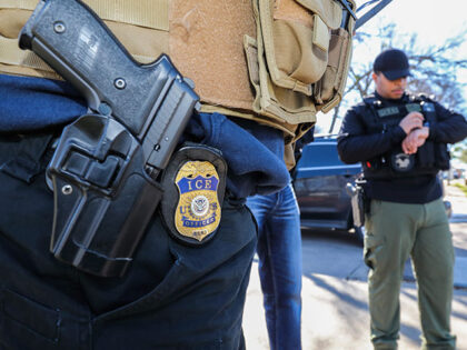Officers with U.S. Immigration and Customs Enforcement arrest fugitives as part of Operati